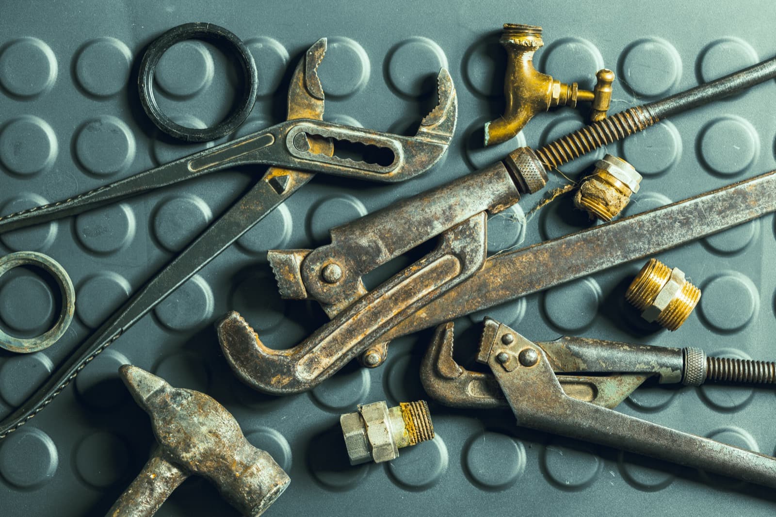 Well-worn plumbing tools reflecting the older pipe common near Weatherford's historic square